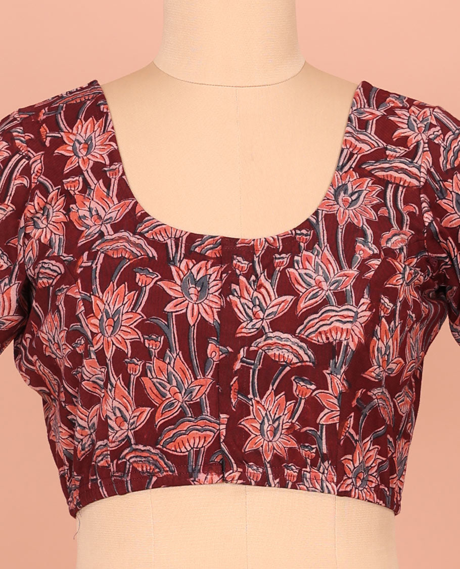 Maroon Cotton Readymade Blouse Bedecked with All-Over Floral Motifs Print, Featuring a Front Round-Neck, a Back Round-Neck, and Elbow Sleeves