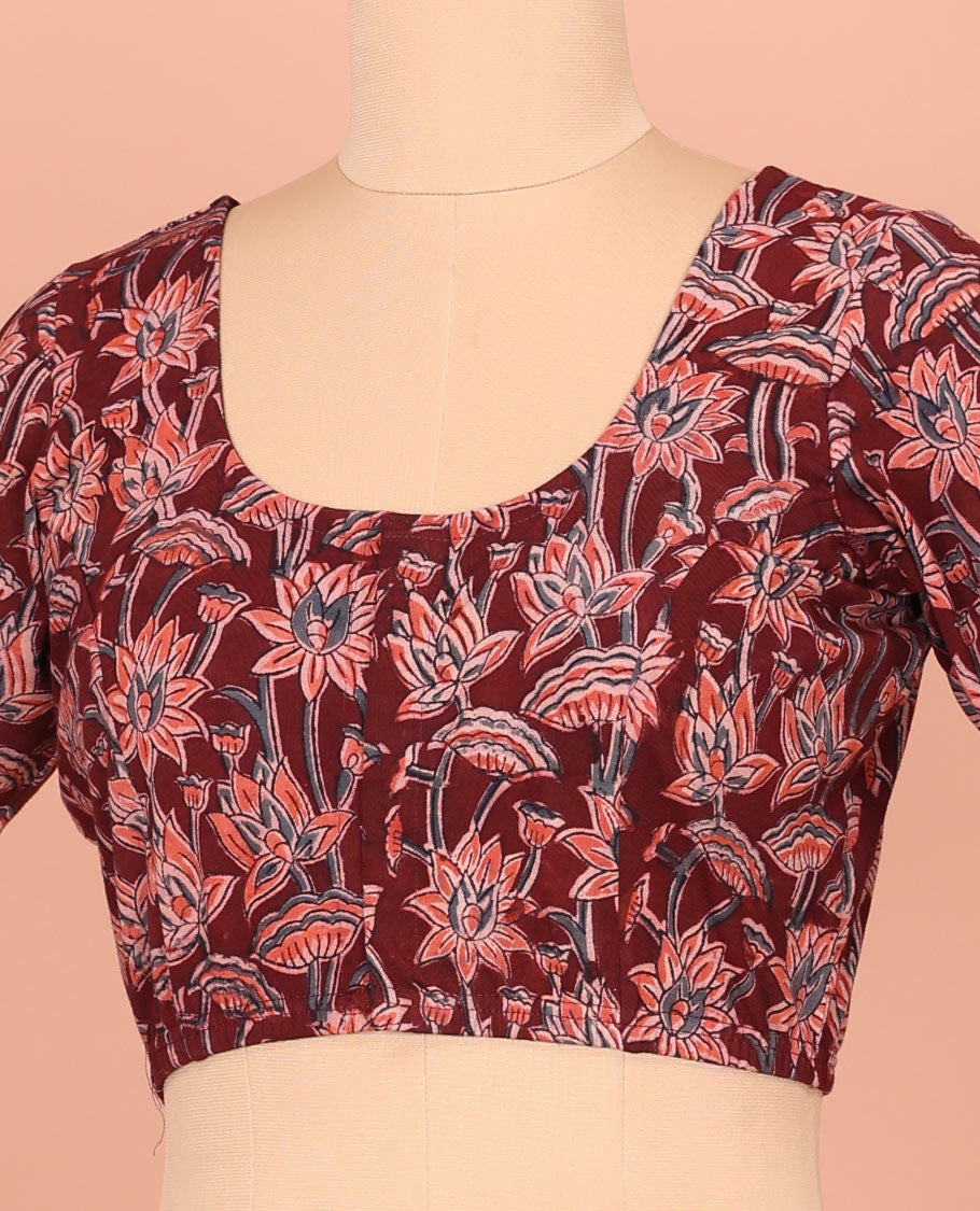 Maroon Cotton Readymade Blouse Bedecked with All-Over Floral Motifs Print, Featuring a Front Round-Neck, a Back Round-Neck, and Elbow Sleeves