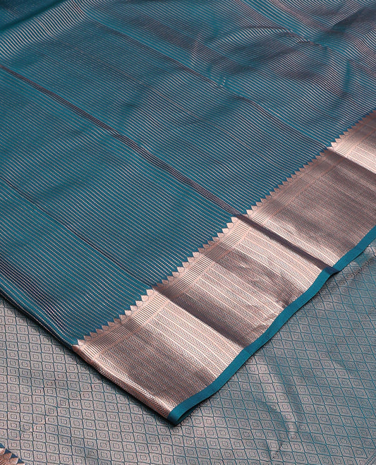 Blue muthu striped Vasundhara silk mix, zari border of thilakam, kathir, and banaras designs, and jaal pallu