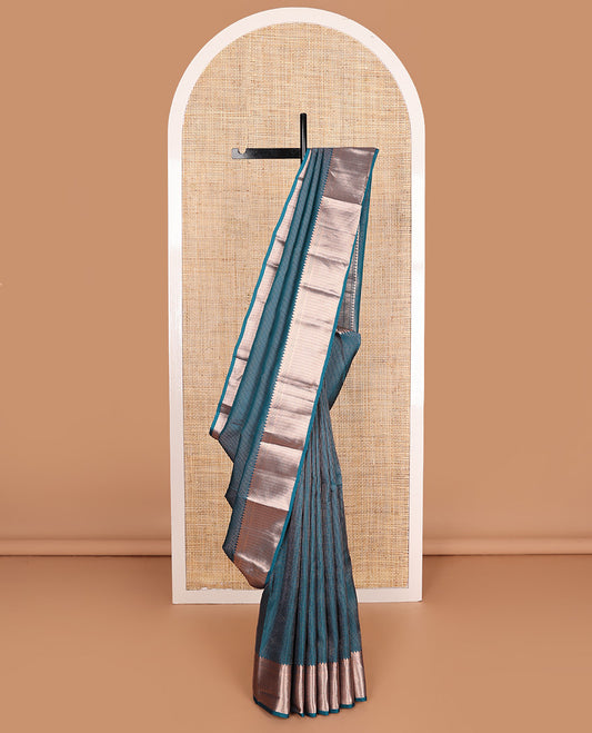 Blue muthu striped Vasundhara silk mix, zari border of thilakam, kathir, and banaras designs, and jaal pallu