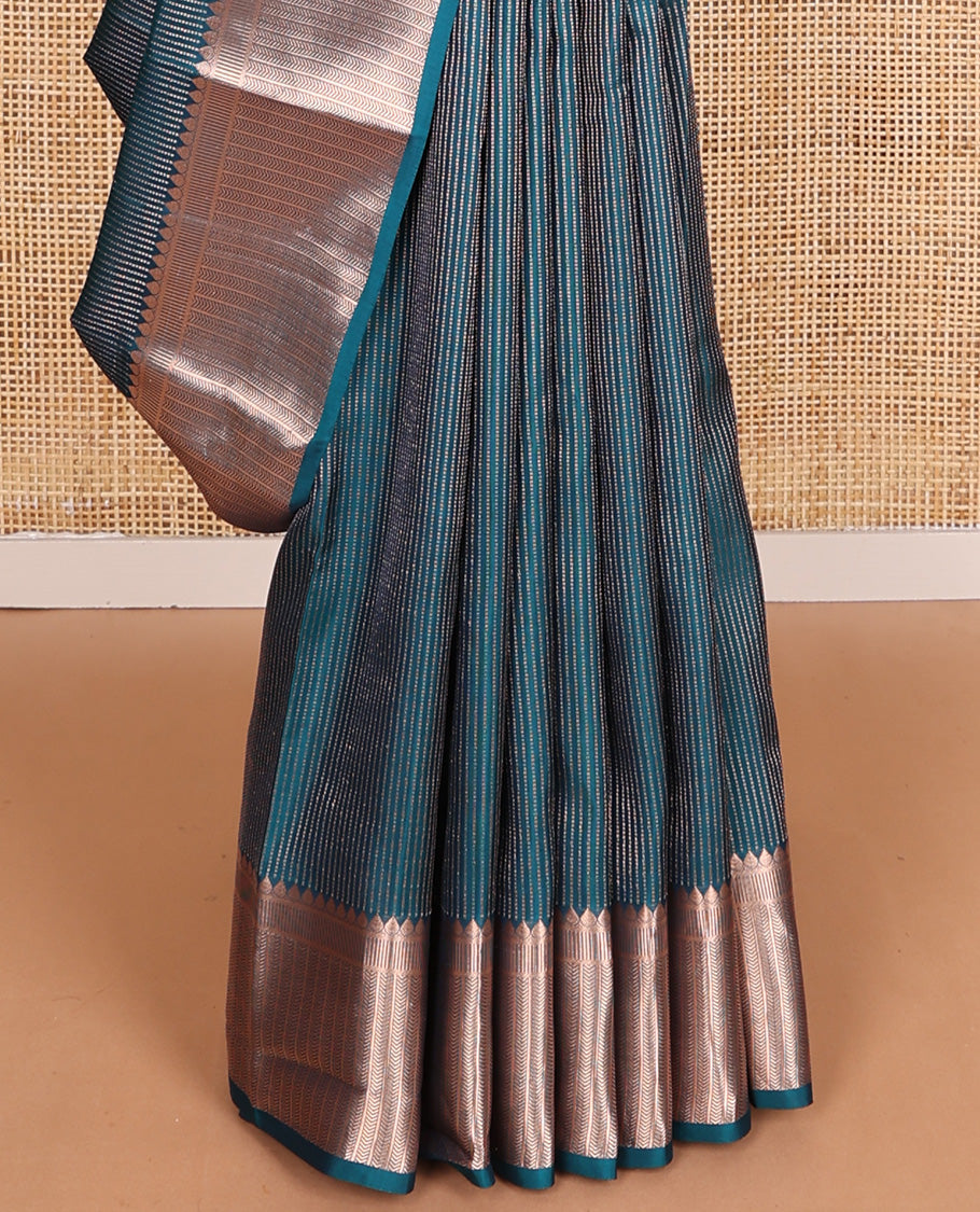 Blue muthu striped Vasundhara silk mix, zari border of thilakam, kathir, and banaras designs, and jaal pallu