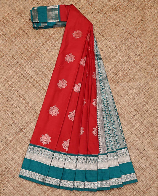 Red Budget Silk Saree, Highlighted by Zari Buttas on Its Body, Complemented by a Contrast Traditional Zari Design Rettai Pettu Border, Intricately Designed Pallu, and Paired with a Contrast Blouse