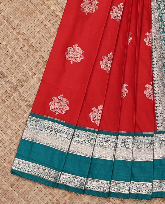 Red Budget Silk Saree, Highlighted by Zari Buttas on Its Body, Complemented by a Contrast Traditional Zari Design Rettai Pettu Border, Intricately Designed Pallu, and Paired with a Contrast Blouse