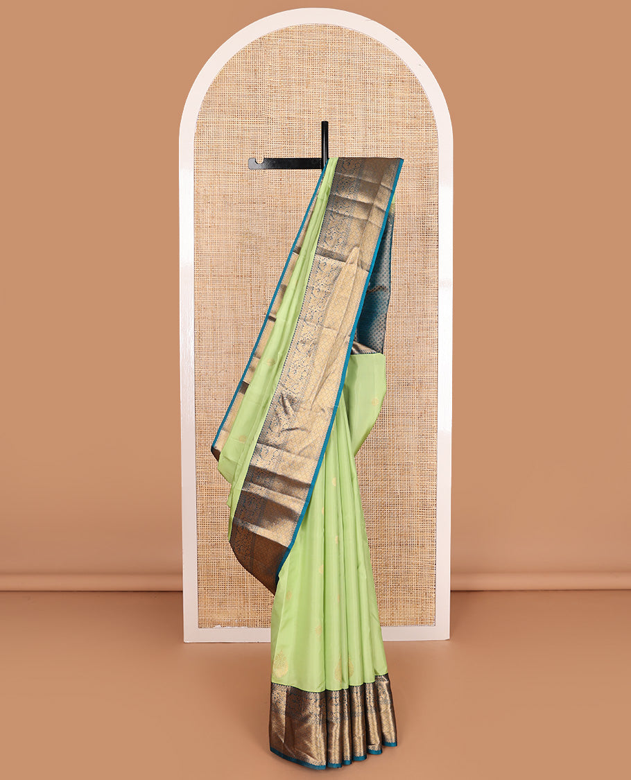 Green zari buttas Vasundhara silk mix, contrast border of traditional designs, and jaal pallu