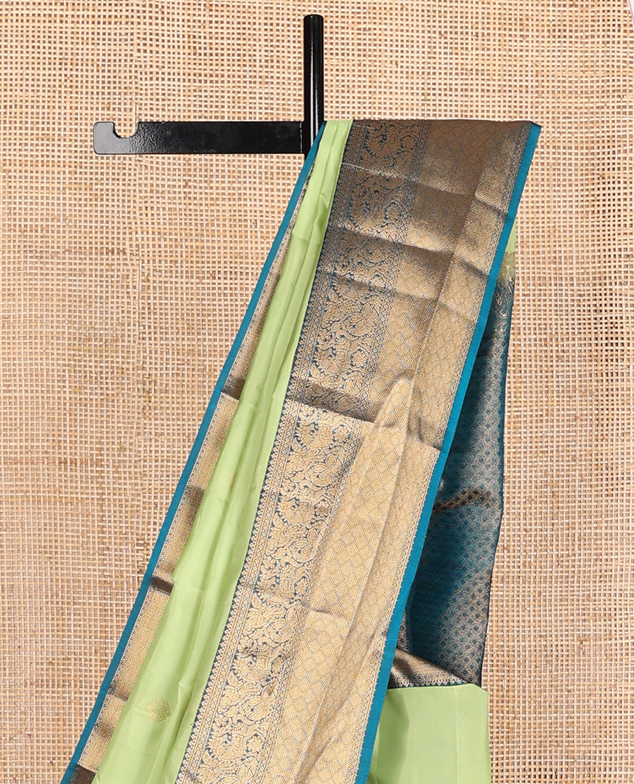 Green zari buttas Vasundhara silk mix, contrast border of traditional designs, and jaal pallu