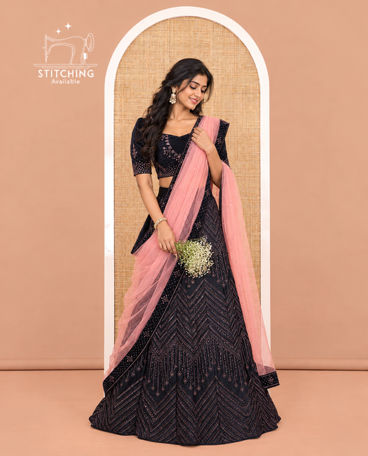 Pink Velvet Half-Saree, gleamed up with Swarovski Stonework Skirt, Matching Stonework Blouse, and Net Stonework Dhavani