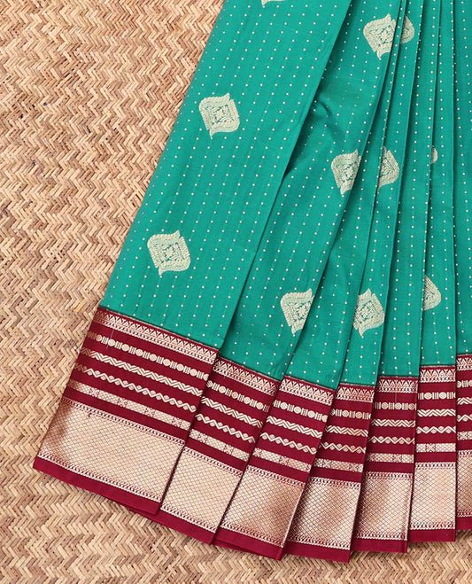 Green Budget Silk Saree, Finely Crafted with Zari Buttas, a Contrast Traditional Zari Border, Grand Pallu, and a Contrast Blouse