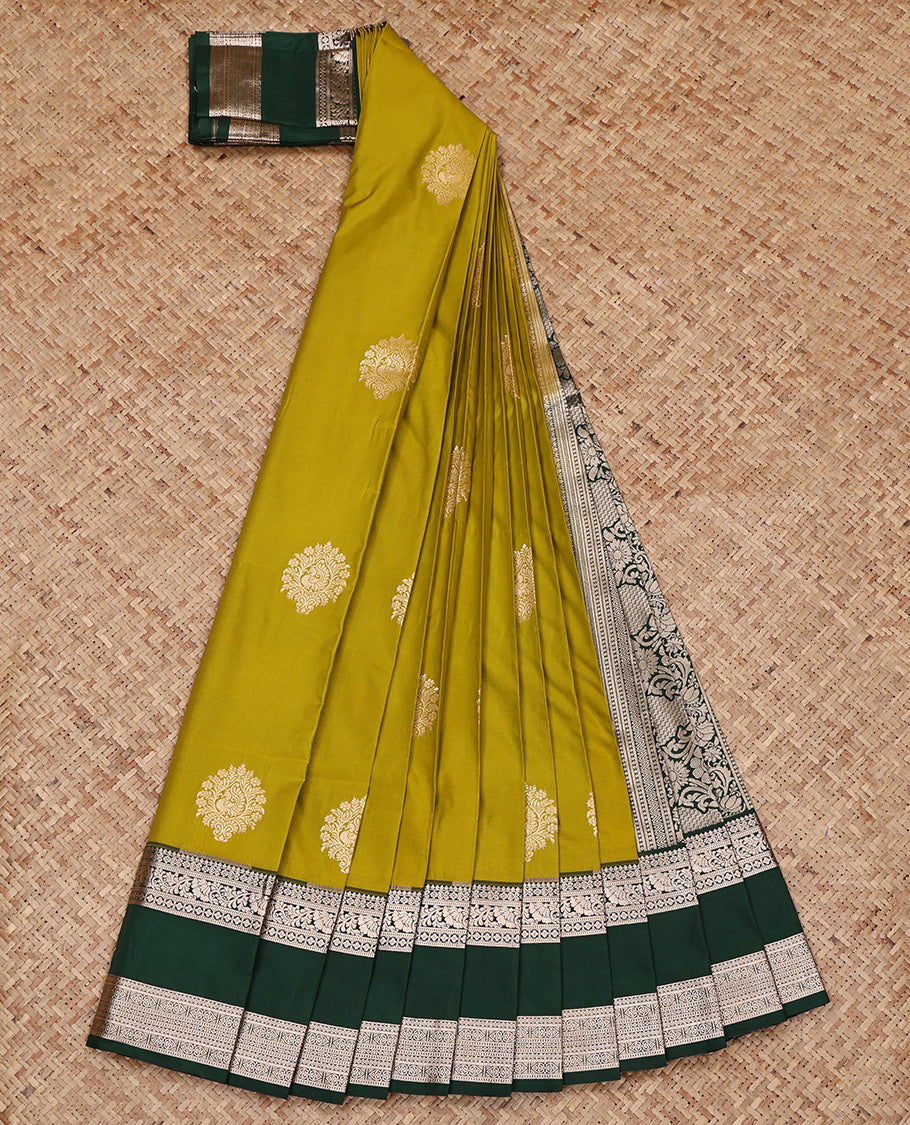 Green Budget Silk Saree, Graced with Zari Buttas All Over Its Body, Complemented by a Contrast Traditional Zari Design Rettai Pettu Border, Intricate Pallu, and Paired with a Contrast Blouse
