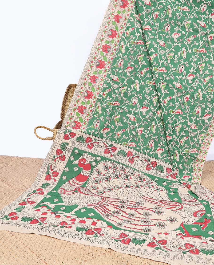 Green floral & bird machine-printed kalamkari cotton saree, contrast floral & chevron border & peacock pallu