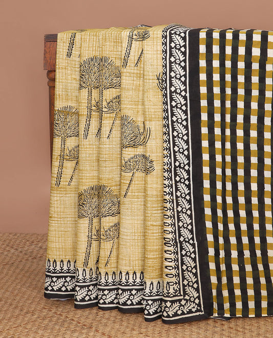 Mustard floral printed mul mul cotton saree, contrast floral printed border & checked printed pallu