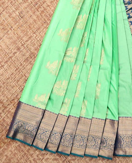 Green Budget Silk Saree, Embellished with Zari Buttas, Complemented by Contrast Traditional Zari Border, a Grand Pallu and a Contrast Blouse