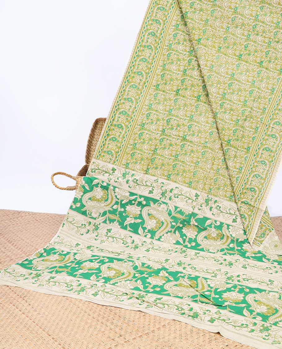 Green intricately machine-printed kalamkari cotton saree, self-border & contrast pallu of floral print