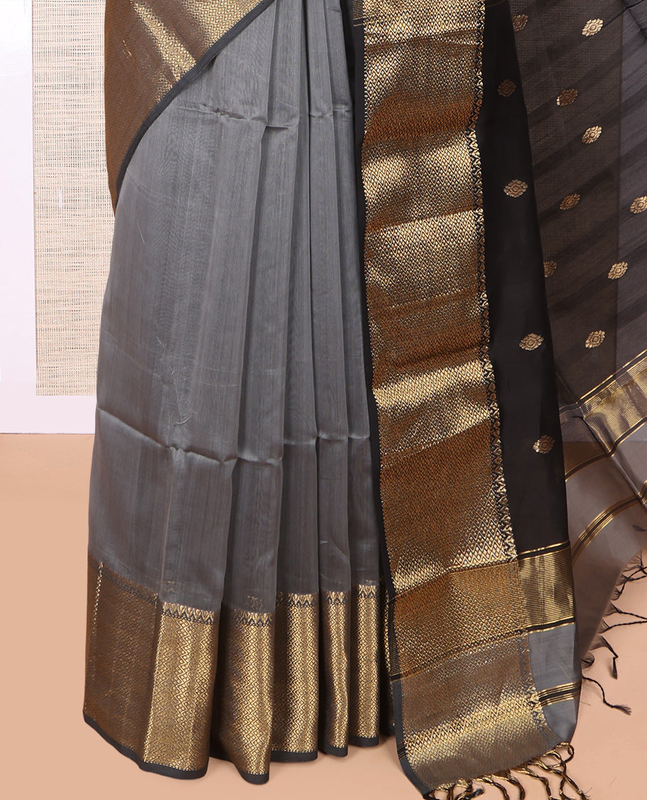 Grey Maheshwari Cotton Saree, Adorned with Buttas, Highlighted by a Traditional Zari Border, Pallu Gleamed Up with Zari Buttas, and a Contrast Blouse