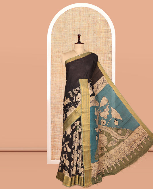 Black Kalamkari Silk Saree, Impeccably Styled with Animal and Human Figurines, a Contrast Traditional Zari Border, Pallu of Kalamkari Design, and a Contrast Blouse