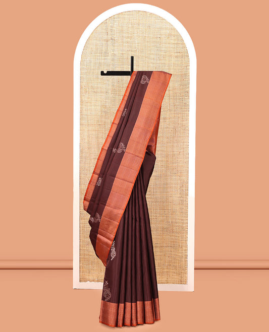 Brown Kanchipuram Silk Saree, Embellished with Floral Buttas, Complemented By Contrast Zari Border, Grand Jaal Pallu, and a Contrast Blouse