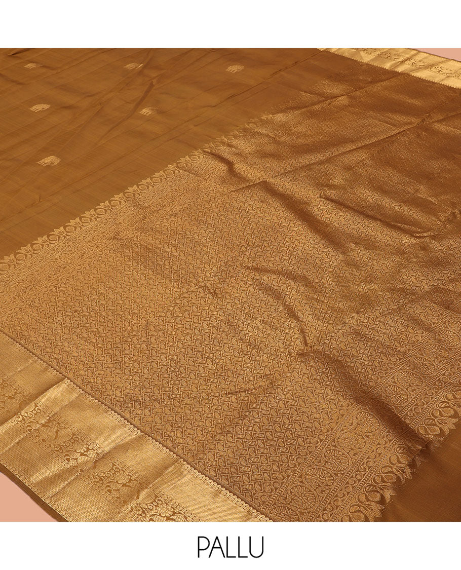 Brown Kanchipuram Silk Saree, Adorned with Yaanai Buttas, Highlighted by Zari Border of Rekku, Poun, Mayil, and Mayil Kann, Zari Design Pallu, and Matching Blouse