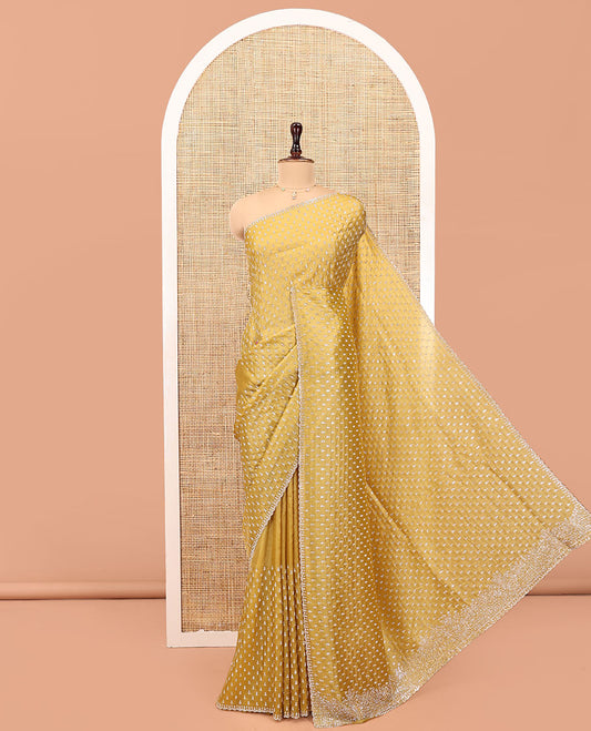 Mustard Designer Saree, Spotlighted with Stone Work All Over Its Body, Intricately Stone Woven Pallu, and Paired with a Matching Blouse