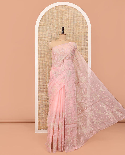 Light Peach Organza Saree, Finely Crafted with Floral Jaal Applique Embroidery All Over Its Body, Scallop Lace Border, Floral Embroidered Pallu, and Paired With a Embroidered Blouse