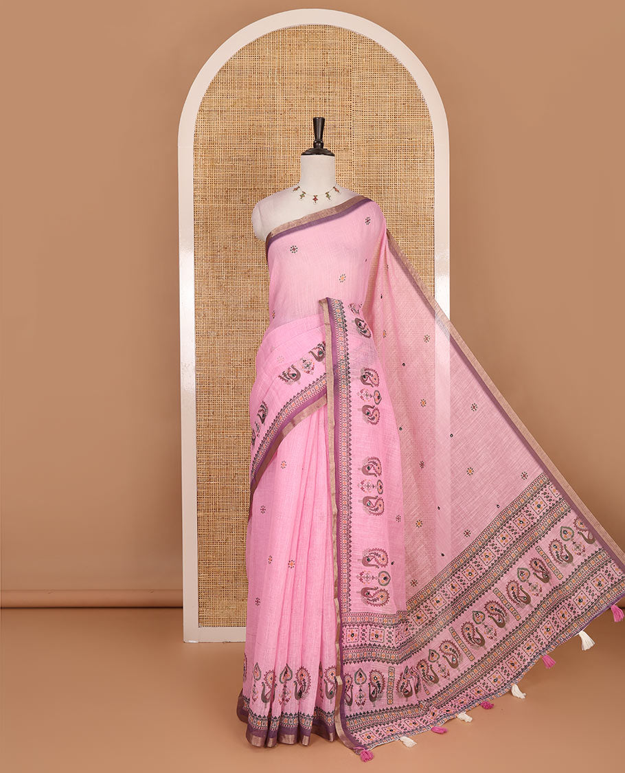 Pink buttas with mirror work linen saree, zari border with peacock motifs print, printed mirror work pallu, and matching blouse