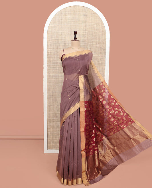 Brown Chanderi Cotton Saree, Bedecked with Floral Buttas All Over Its Body, Highlighted by a Zari Border, Captivating Contrast Pallu of Floral Jaal Designs, and Paired with a Contrast Blouse