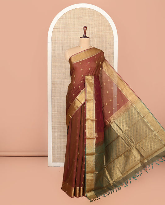 Brown Silk Cotton Saree, Accentuated with Zari Buttas All Over Its Body, Highlighted by Traditional Zari Border, Diagonally Woven Pallu and Paired With a Contrast Blouse