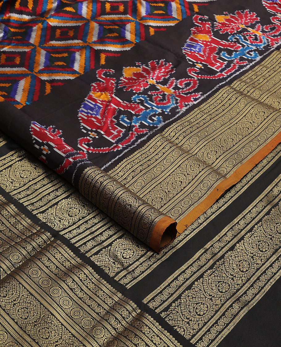 Black geometric, floral & animal design ikkat saree with contrast zari design border & traditional zari design pallu