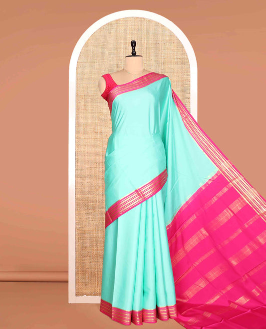 Turquoise Plain Mysore Silk Saree, a Contrast Traditional Zari Border, Zari Striped Pallu, and a Contrast Blouse