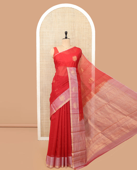 Red Silk Cotton Saree Featuring Zari Buttas, a Contrast Zari Buttas Border, Geometric Patterned Pallu, and a Contrast Blouse