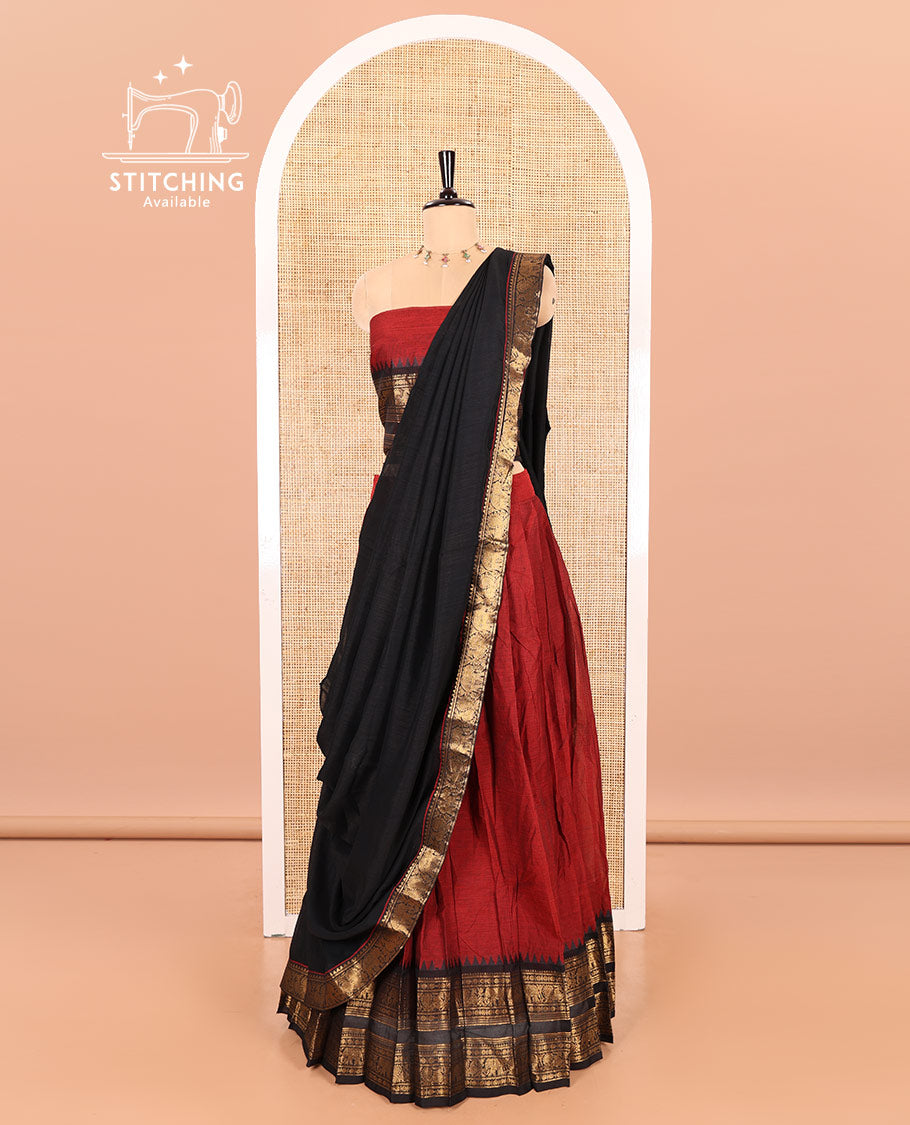 Maroon-Black Chettinad Cotton Half-Saree Featuring a Plain Skirt, Highlighted with a Contrast Peacock-Elephant Motifs Woven Rettai Pettu Zari Border, a Subtly Woven Matching Blouse, and a Vichitra Silk Contrast Traditional Zari-Bordered Dhavani