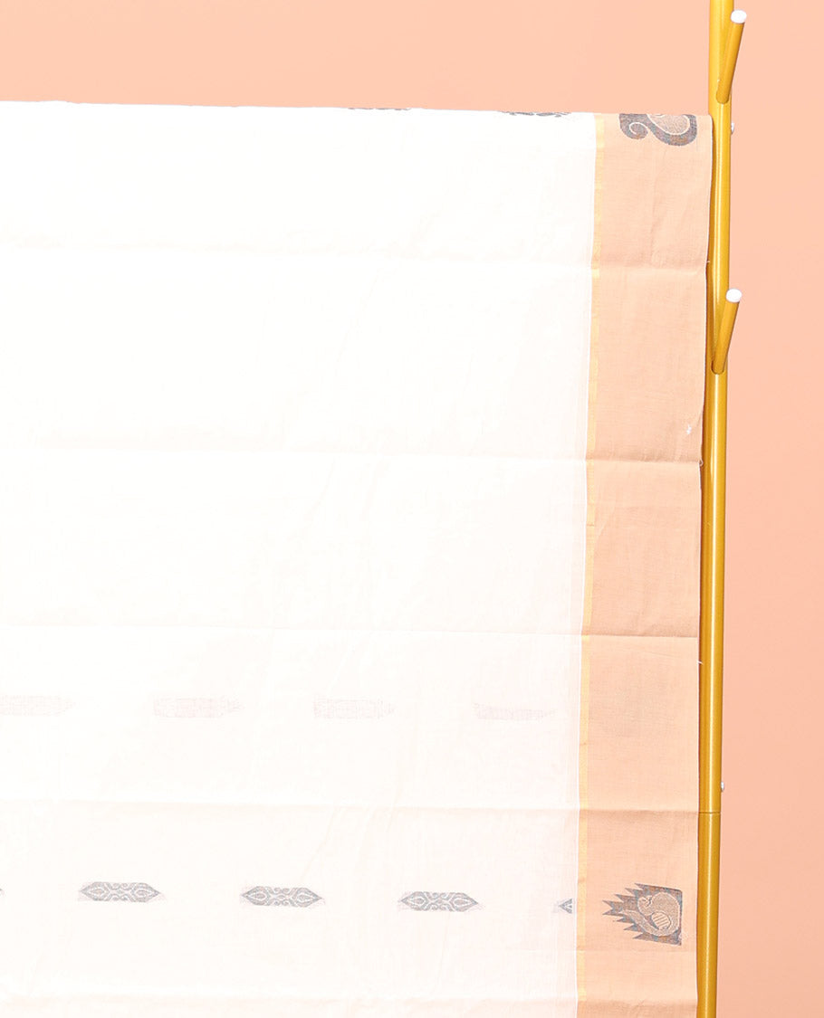 White Kanchi Cotton Saree, Crafted with Buttas All Over Its Body, a Complemented by Contrast Temple Border, Pallu of Tree Designs, and Paired with a Matching Blouse