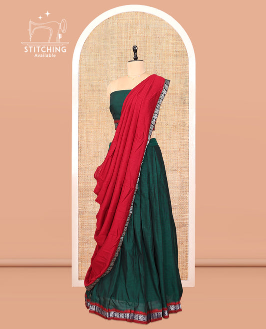 Green Cotton Half-Saree Features Plain Skirt, a Contrast Peacock Border, a Matching Blouse, and a Contrast Red Dhavani
