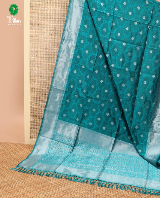 Peacock green  jaal design litchi soft silk saree with silver weaving border & silver zari rich pallu along with butta design blouse
