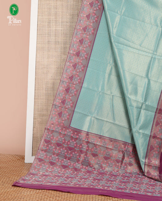 Green copper zari weaving litchi silk saree with contrast meena butta border & meena style design pallu along with contrast blouse