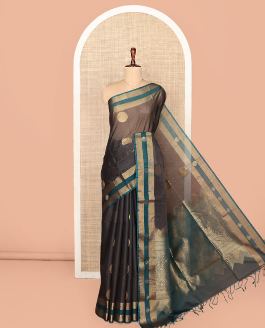 Grey Silk Cotton Saree, Accentuated with Polka Dot Buttas, Complemented by a Contrast Zari Buttas Border, Intricately Designed Pallu, and a Contrast Blouse