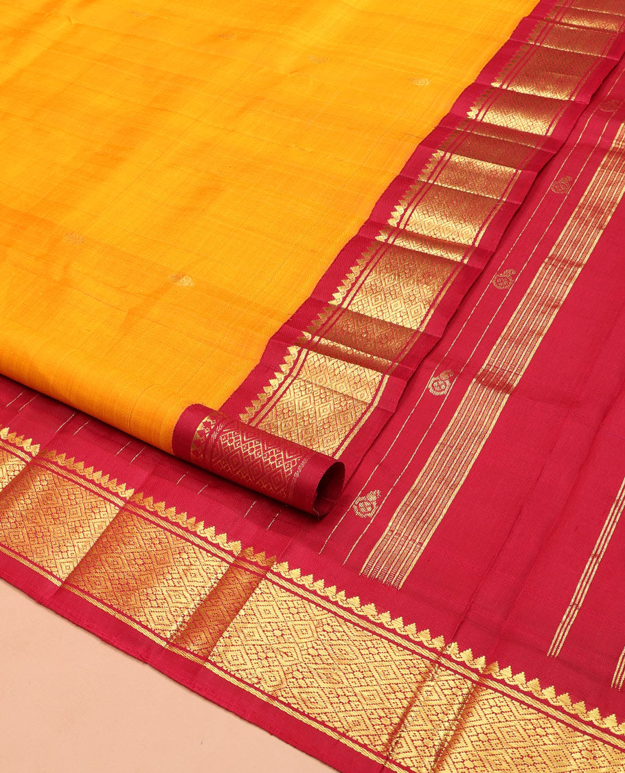 Yellow Kanchipuram Silk Saree, Sparsely Woven with Zari Buttas on Its Body, Complemented by Contrast One-Sided Korvai Border of Thilakam Mokku, Banaras, and Jaal Designs, Pallu Features Zari Designs, and Comes Without a Blouse