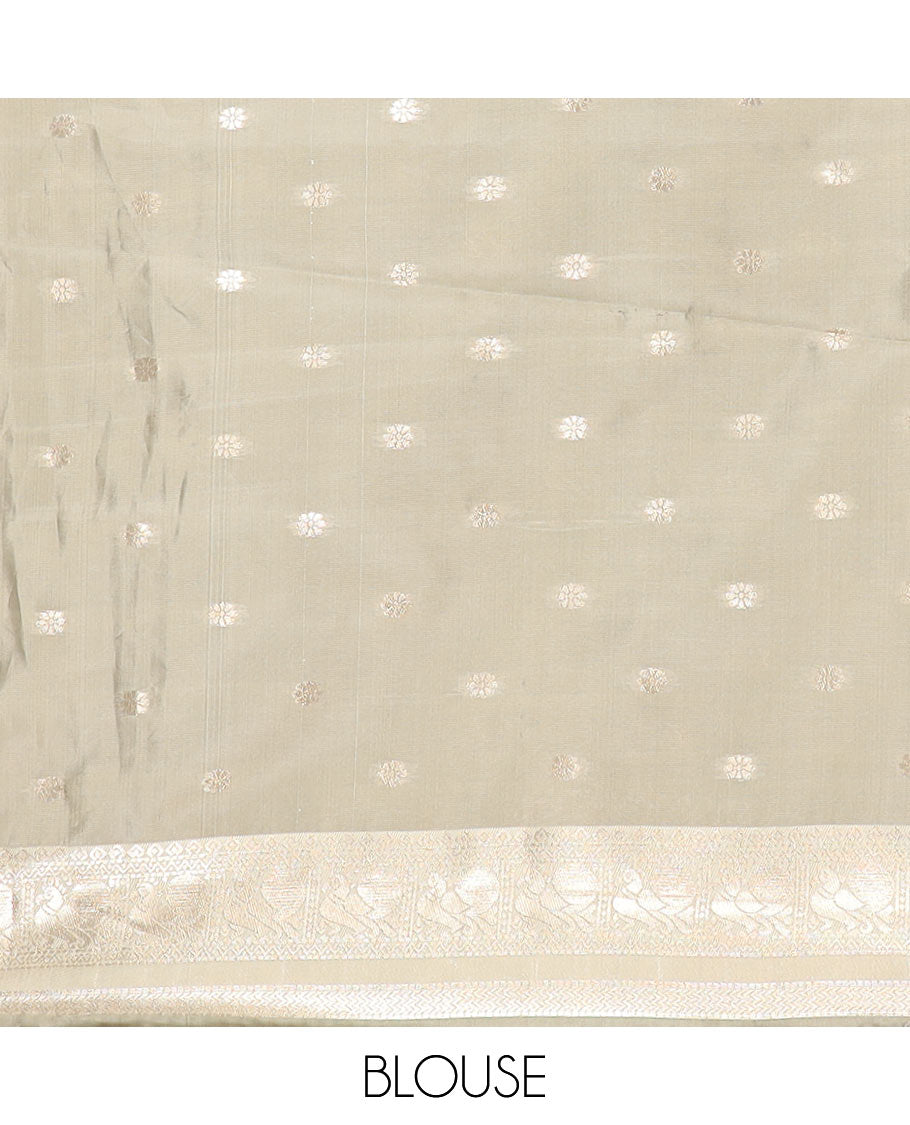 Coffee Brown Litchi Saree Decorated with Peacock Chakram Butta Enclosed Zari Checks, Complemented by a Contrast Rettai Pettu Border of Peacock Designs, Intricately Woven Pallu Steeped with Peacock Designs, and Paired with a Contrast Blouse
