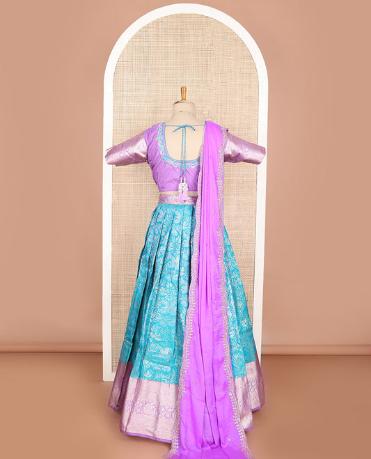 Blue floral art silk half saree with contrast zari design border, embroidered blouse & floral embroidery dhavani