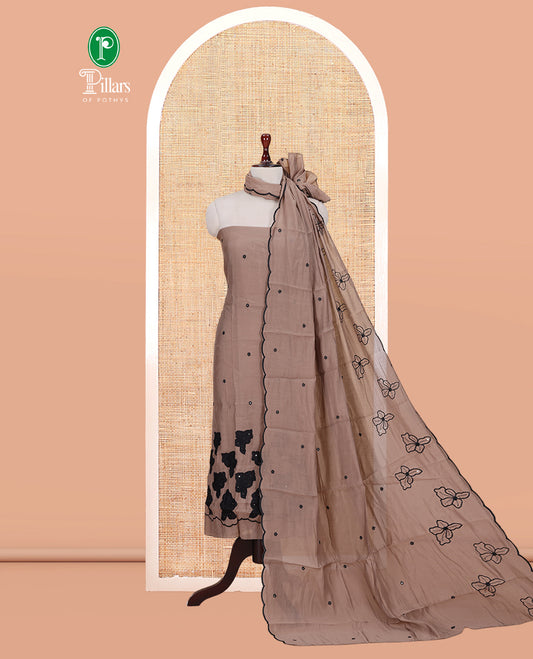 Light Brown Mul Chanderi Material Churidar Features Floral Thread Embroidered Top, a Matching Bottom, and an Scallop Embroidered Dupatta