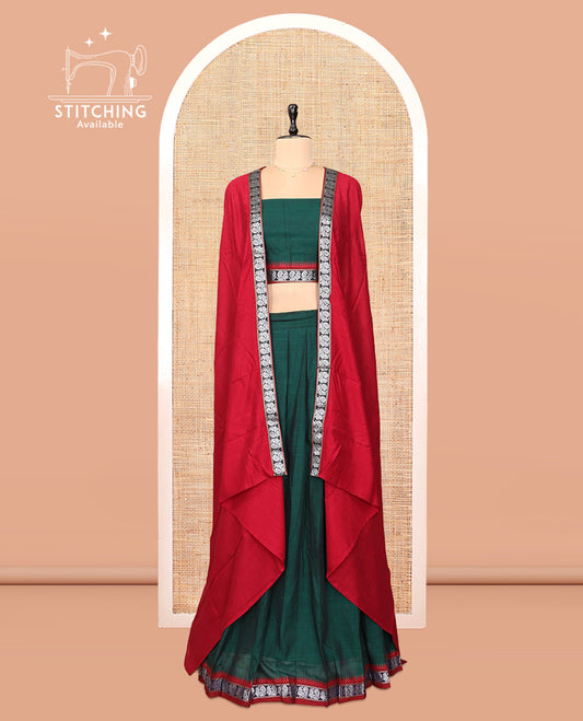 Green Cotton Half-Saree Features Plain Skirt, a Contrast Peacock Border, a Matching Blouse, and a Contrast Red Dhavani