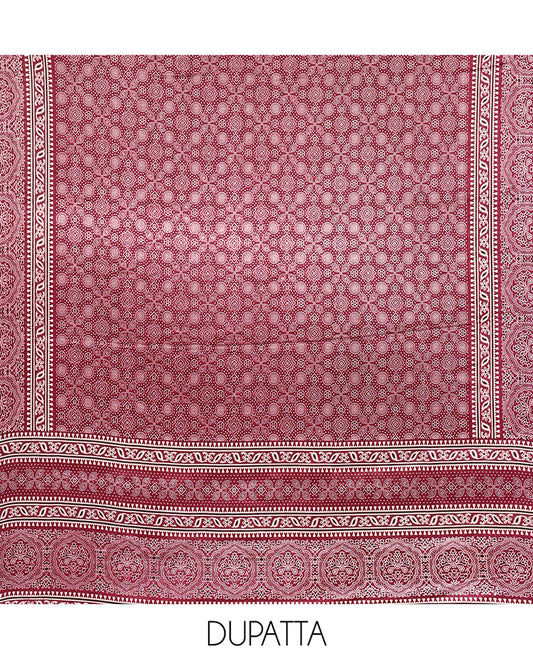 Magenta Material Chudidhar Set, Enriched with Ajrakh Patch Work and Mirror Work Vichitra Silk Top, Plain Santoon Bottom, and Chinon Silk Dupatta Featuring Intricate Ajrakh Prints
