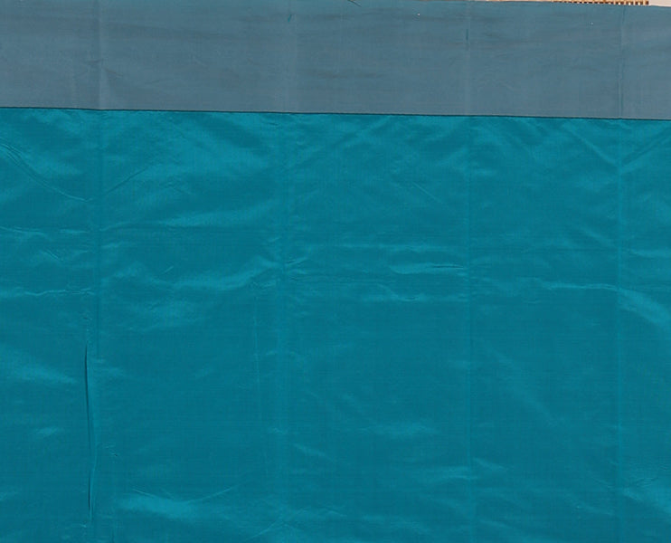 Peacock green butta silk cotton , contrast bawanchi border & thread weaving rich pallu with tussels