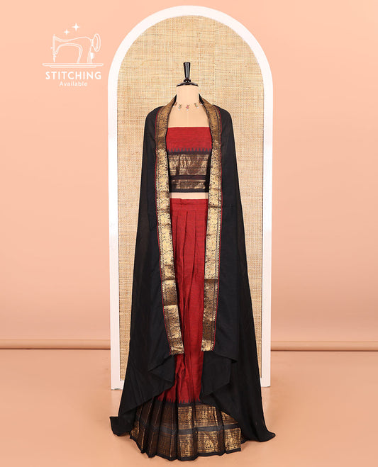Maroon-Black Chettinad Cotton Half-Saree Featuring a Plain Skirt, Highlighted with a Contrast Peacock-Elephant Motifs Woven Rettai Pettu Zari Border, a Subtly Woven Matching Blouse, and a Vichitra Silk Contrast Traditional Zari-Bordered Dhavani