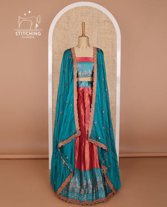 Red tissue half saree with contrast forest theme border, forest theme design blouse & floral embroidery, scallop border dhavani
