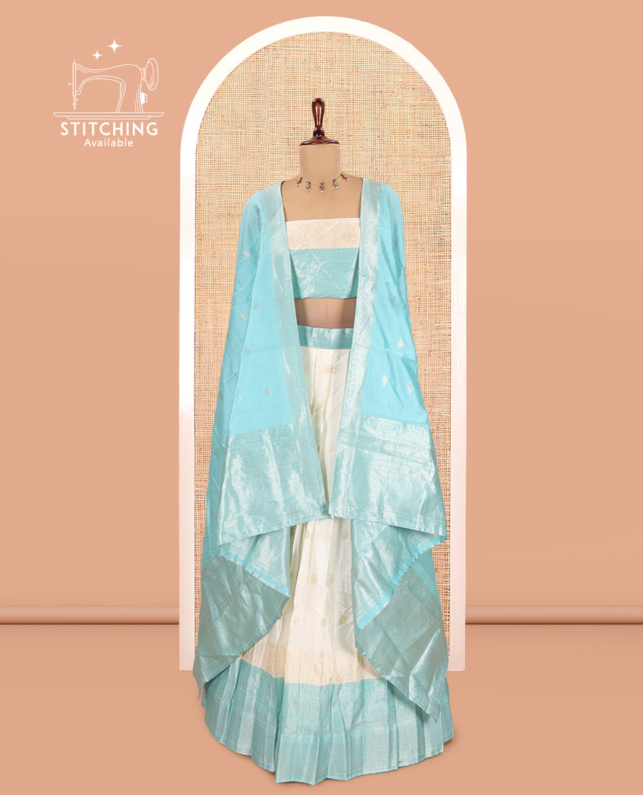 Cream-Blue Semi-Silk Half-Saree, Subtly Sparkled with Zari Buttas Skirt, a Contrast Traditional Zari Border, and a Contrast Dhavani