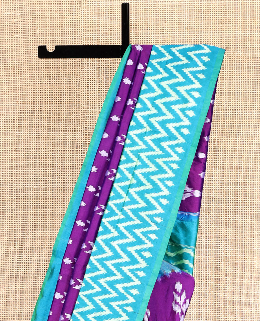 Purple Pochampally Ikat Silk Saree, Embellished with Ikat Buttas, Complemented by a Contrast Chevron-Striped Border, Ikat Chevron Pallu, and a Contrast Blouse