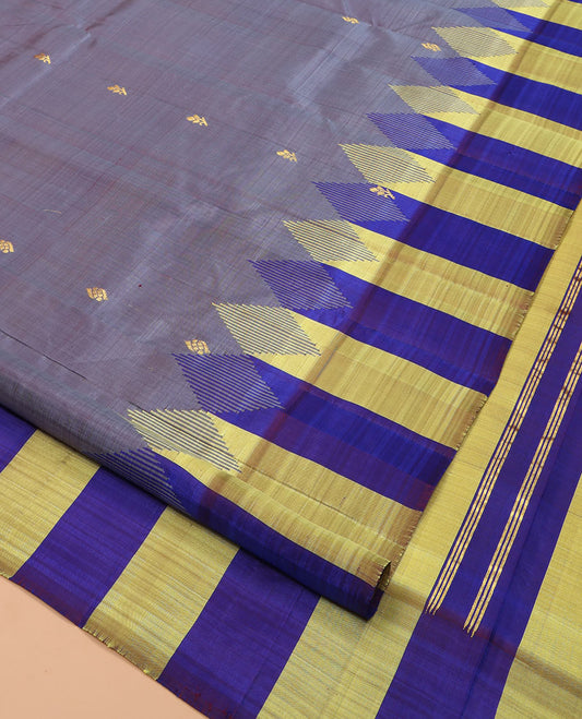 Grey Kanchipuram Silk Saree, Elevated with Zari Buttas, Complemented by a Contrast One-Sided Thazampoo Rekku Border, Zari Woven Pallu, and a No Blouse