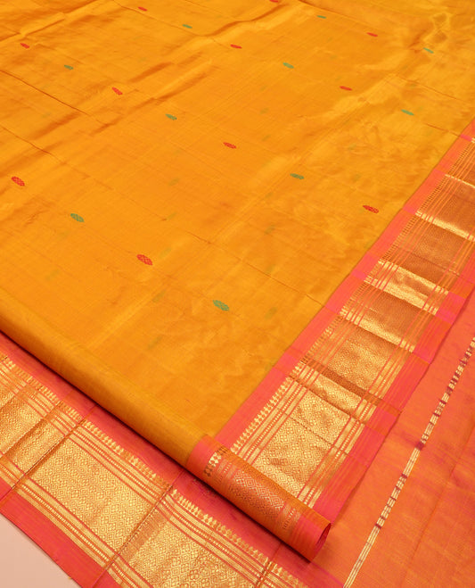 Orange Kanchipuram Silk Saree, Woven with Thread Buttas, Contrast One-Sided Border of Panner Sombu, Banaras, Muthu, and Jaal Designs, Zari Design Pallu, and No Blouse