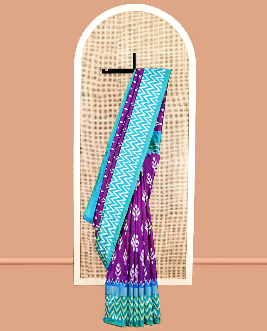 Purple Pochampally Ikat Silk Saree, Embellished with Ikat Buttas, Complemented by a Contrast Chevron-Striped Border, Ikat Chevron Pallu, and a Contrast Blouse