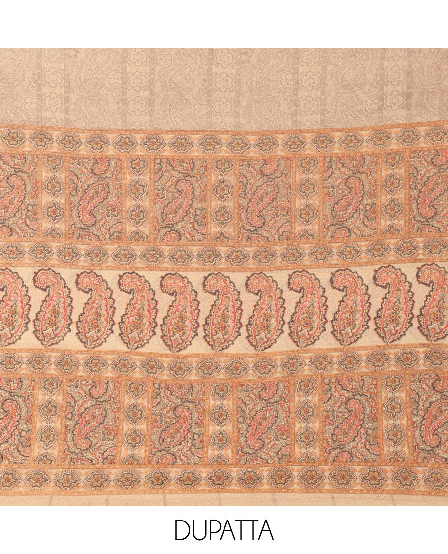 Light Pista Material Chudidar Set Intricately Printed with Paisley Motifs on the Italian Crepe Top, Subtly Negative Printed Bottom, and Italian Crepe Dupatta of the Same Paisley Prints