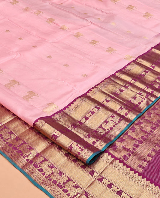 Pink Vasundhara Silk Saree, Gleamed Up with Pichwai Cow and Lotus Buttas, a Contrast Border of Rekku, Mayil Kann, Vanki, Lotus, and Cow Designs, Grand Pallu, and a Contrast Blouse